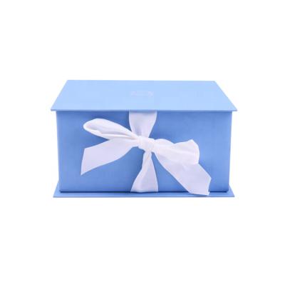 China Recycled Materials Hot Sale Custom Blue Foldable Magnetic Gift Boxes With Ribbon Closure for sale