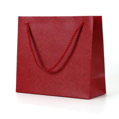 China Luxury Recycled Materials Custom Logo Gift Paper Bag With Handle Black Art Paper Bag For Jewelry for sale