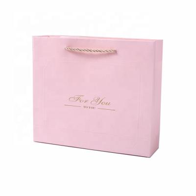 China Wholesale Custom Recyclable Kraft Paper Bags With Your Own Logo Luxury Pink Custom Logo Paper Bag Printing for sale