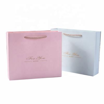 China Custom Recyclable Wholesale Colored Paper Bag With Handle Pink Kraft Paper Bag Custom Printing Logo for sale