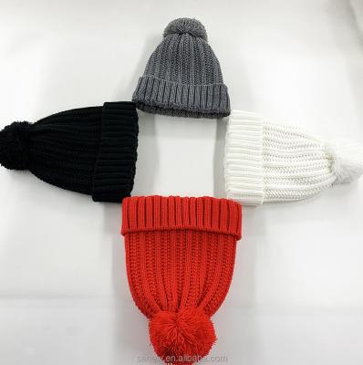 China JOINT Multicolor Jacquard Pom Fleece Warm Beanie Knitted Beanie for sale