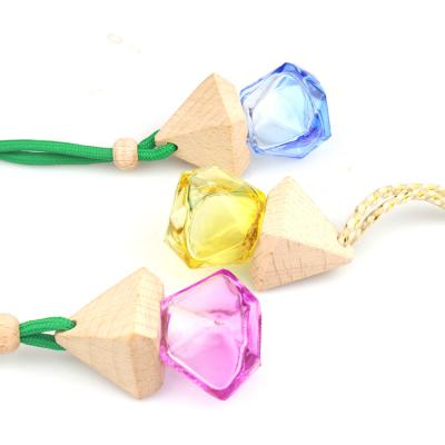 China New 8ml Eco-friendly Recyclable Wooden Triangle Cap Car Glass Pendant Diffuser Bottle Perfume Bottle Hanging Perfume Bottle for sale