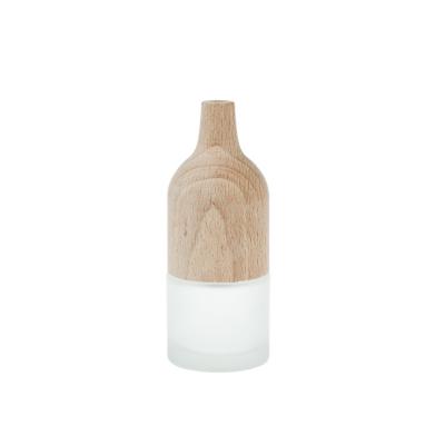 China 35ml Aromatherapy Customized Home Decor Wooden Lid Frosted Glass Diffuser Bottle for sale