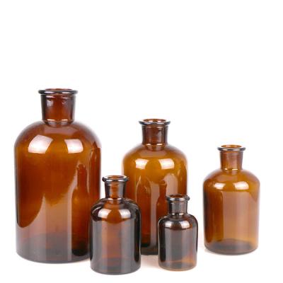 China Customization 250ml Recyclable Different Capacity Factory Price Amber Glass Wide Mouth Reagent Anti-Corrosion Bottles for sale