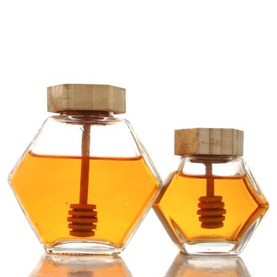 China Wholesale Glass Honey Jar Personal Care Container With Bamboo Lid Bucket Empty Honey Jar Hexagon for sale