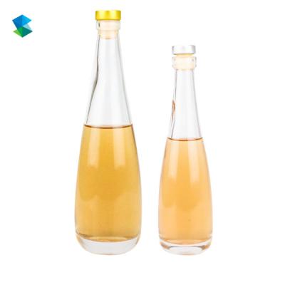 China 330ml 500ml Long Neck Recyclable High Quality Cork Top Custom Transparent Glass Liquor Bottle for sale