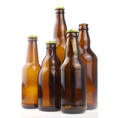 China Eco-friendly Recyclable 330ml Empty Glass Wine Bottles Amber Glass Beer Bottles With Metal Crown Cap for sale