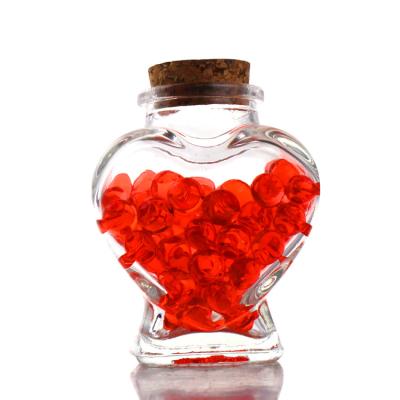 China Personal Care 75ml Heart Shape Glass Decorative Mini Wish Bottles With Cork Lid for sale