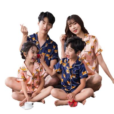 China 2022 hot sale QUICK DRY summer men's and women's sleepwear family pajamas matching sets to support sleep-coat pajamas children's wholesale fabrics for sale