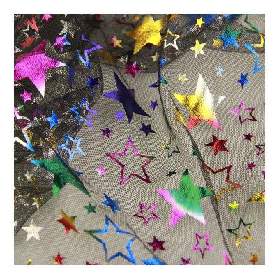 China Tear-Resistant Colorful Factory Outlet Star Profile Stage Suit Foil Printing Mesh Fabric for sale