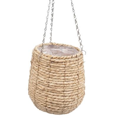 China Sustainable natural water hyainth wall hanging basket with plastic container indoor plant flower pots for decor for sale