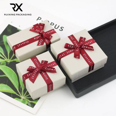 China Square Ruixing bow gift box logo small red jewelry box jewelry box can be customized for sale