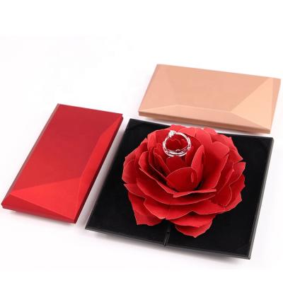 China LOGO Color Rotating Ring Box Popular Foldable Plastic Flower Ring Box Custom Amazing Gift Rotating Flower Ring Packaging for sale