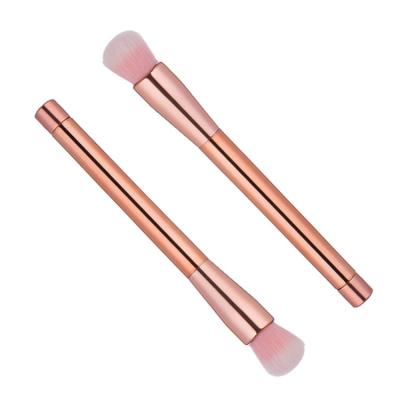 China Flat Brush Rose Gold Highlight Brightening Round Single Head Buffing Plastic Handle Fiber Wool Magic Makeup Brush for sale