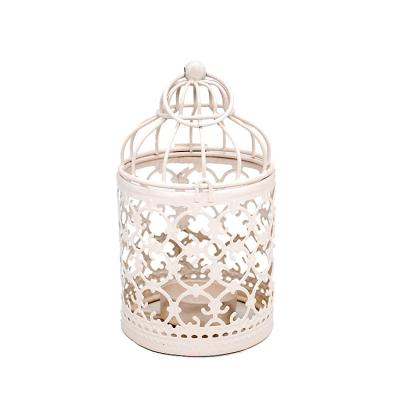 China Home Decoration Hollow Out Design Metal Iron Art Decorative Candlestick Candle Lantern for sale