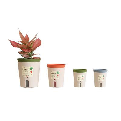 China Dia.10.6*H.12.8cm CLASSIC two part vertical lazy pot plastic self watering pot for sale