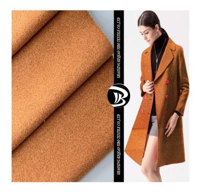 China Yibo flame retardant textile yarn dyed thick 100%polyester herringbone wool blended jacquard fabric for coat for sale