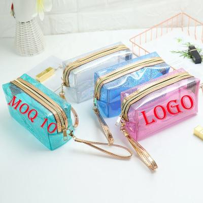 China Durable Custom PU Cosmetic Bags Clear Jelly Travel Makeup Brush Bags for sale