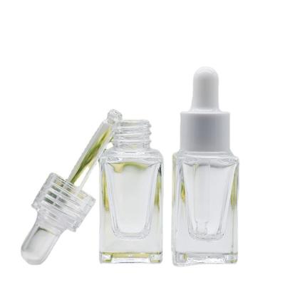 China Personal care skin care packaging 10ML clear oil cosmetic squareg glass dropper bottle and pipette for sale