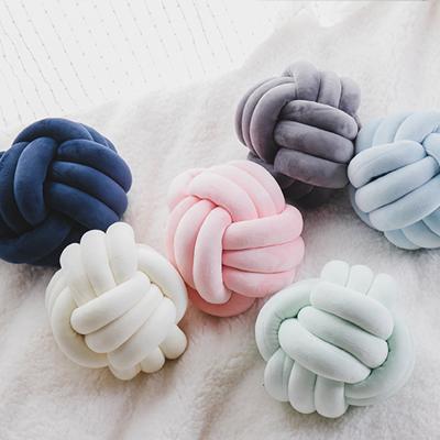 China Round Crate Anti-Static Knot Pillow Cotton Pompom Lumbar Support Pillow for sale