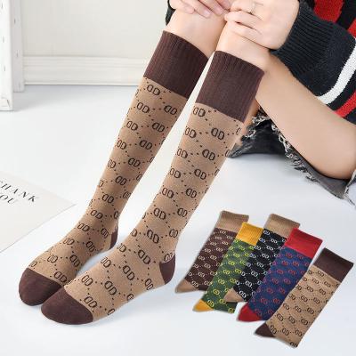 China Sportsman in autumn and winter long tube socks, Korean net red pile of socks fashion soft calf socks for sale