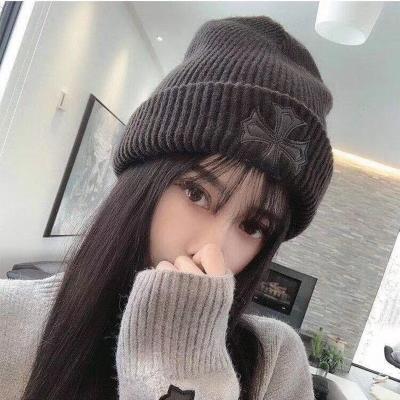 China JOINT warm woolen hat fashion all-match autumn and winter hat ear-guard cross knit hat woman for sale