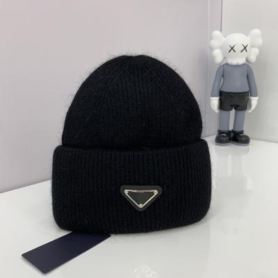 China Autumn and winter style P style JOINT home inverted triangle high quality luxury brand knitted hat women's wool hat warm knitted hat for sale