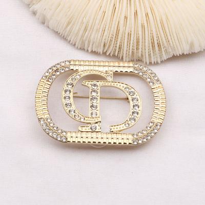 China Daily life home set diamond brooch set fashionable lady's sweater accessories CD letter badge brooch pin ornaments double large for sale