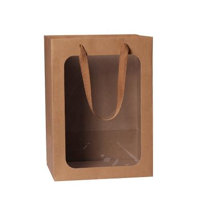 China Hot Selling Biodegradable Flower Brown Kraft Florist Kraft Paper Box Bouquet Carrier Bag Biodegradable Paper Bag For Gift for sale