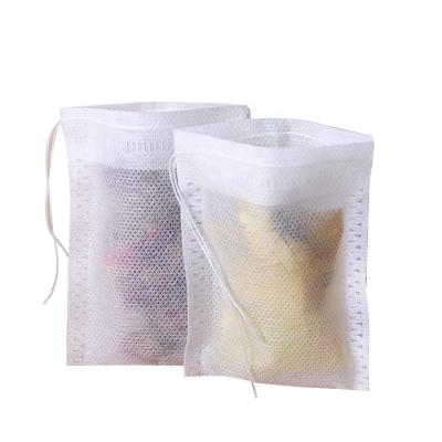 China Biodegrable Tea Paper Bag Tea Filter Paper Bag Disposable Nonwoven Tea Filter Bag With Drawstring for sale