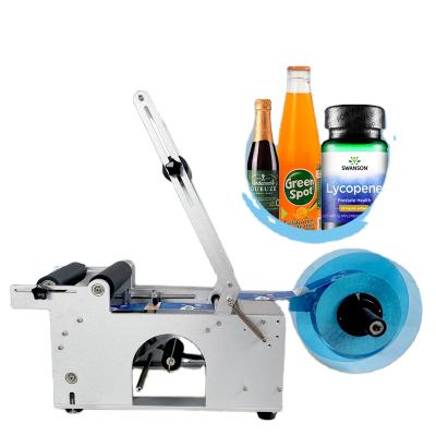 China High Quality Semi Automatic Horizontal Cold Sticker Labeler Round Bottle Food YK Glue Labeling Machine for sale