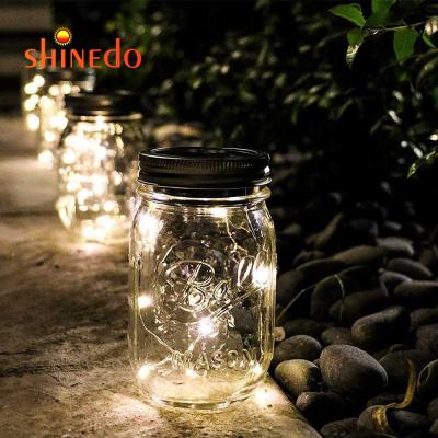 China Warehouse Solar Glass Bottle With Wire Jar Lids And Wire Handles Solar Jar With Magnet Switch for sale