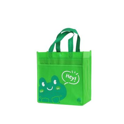 China Custom Happy Children's Day Cartoon Nonwoven Shopping Bag Handled Recycling Tote Bags Logo Printed Factory Direct Wholesale for sale