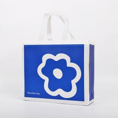 China Handled Clothing Shoes Store Customized Shopping Bags Recycling PP Nonwoven Tote Bags Factory Direct for sale