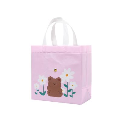 China Cartoon factory wholesale cartoon printing pp film coated nonwoven clothing shopping bag for sale