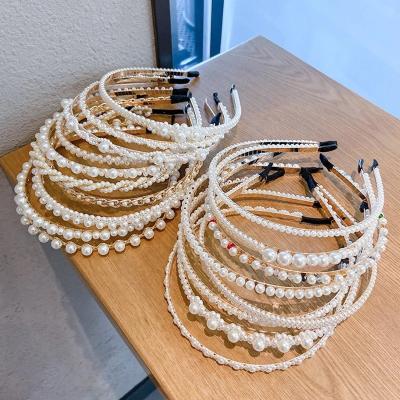 China Handmade Hair Accessories Fashion Custom Women Korean Simple Hair Accessories Braided Pearl Hair Band For Women for sale