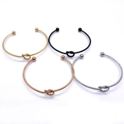 China Stainless Steel CLASSIC Wholesale Customized Twist Cuff Knot Bracelet Love Heart Open Charm Bracelets for sale