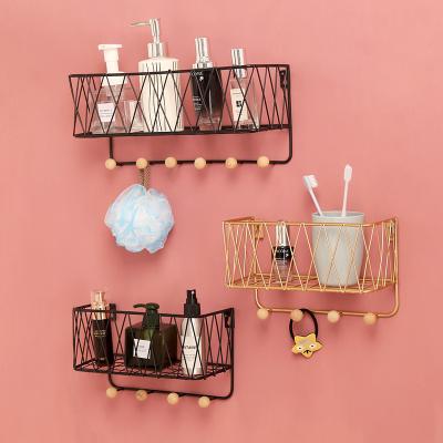 China Simple Modern Storage Living Room Decoration Bedroom Metal Wire Wall Shelf With Hook for sale