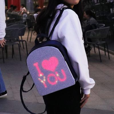 China Wholesale waterproof wifi DIY fashionable laptop smart walk advertising school bag LED light screen display backpack for sale