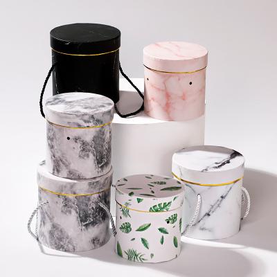 China Custom Materials Flower Gift Box Recycled Portable Round Cylinder Flower Bucket for sale