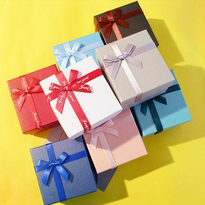 China Recycled Materials Customized Wholesale Multicolor Bow Tie Gift Box Jewelry Box With Hand Gift Box for sale