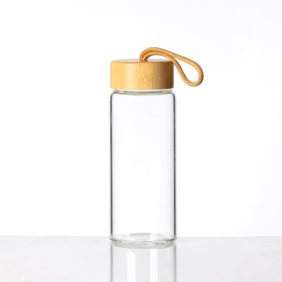 China 500ml Borosilicate Glass Sustainable Eco Friendly Water Bottle With Bamboo Lid for sale