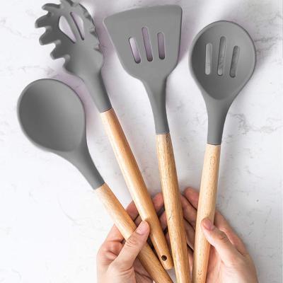 China Kitchen Set Wooden Handle Heat Resistant Silicone Stocked 12 Wooden Handle Kitchen Pieces Set Small Tools for sale