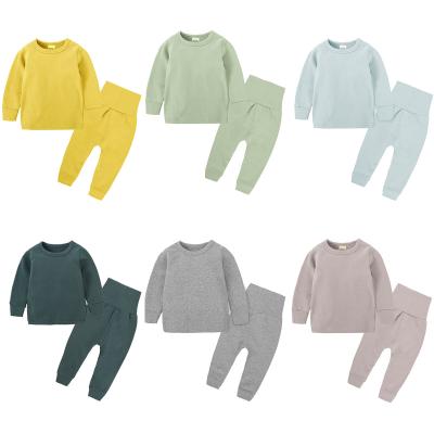 China Casual Pure Color Cotton Fleece Sleepwear Kids Pajamas Set Autumn Winter Boys Girl Clothes for sale