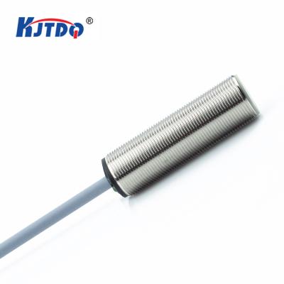 China KJT M18 NPN PNP 2 Wire Sn 8/12mm Universal Flush Bottom DC 12V 24V Inductive Proximity Sensor for sale