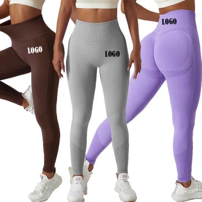 China Custom Logo Running Tights Fitness Women's Breathable Hip Lift Seamless Knit Breathable High Waist Sports Yoga Pants for sale