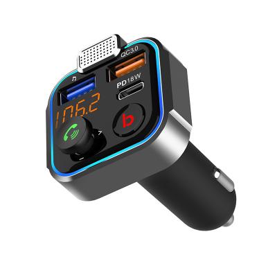 China Five-Way Directional Button On Handsfree Phone Calls Blue LED Breathing Dual SUB Car Charger Car MP3 Player Light Charging FM Transmitter for sale