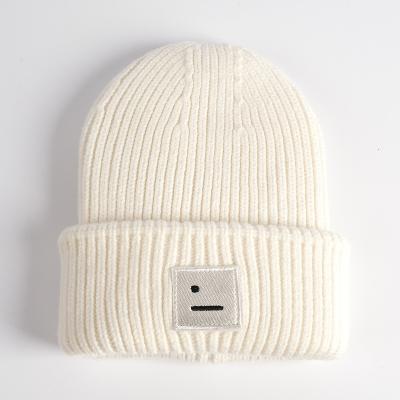 China JOINT Outdoor Winter Warm Wool Designer Adjustable Knitted Hat White Beanies Hat For Women for sale