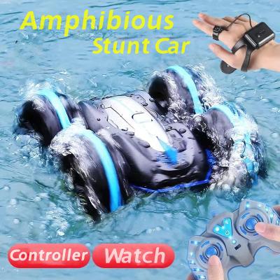 China Auto Return Gesture Feeling Watch Control RC Car Double Sided Amphibious Land Water Stunt Toys 360 Radio Remote Control RC Car For Kids for sale