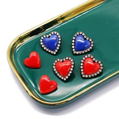 China Other Red Heart Shaped Resin Needle Earrings Red Silver Heart Shaped Side Drill Earrings for sale